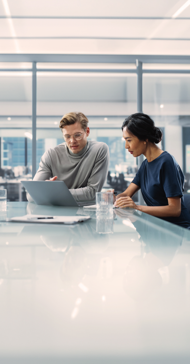 Two people at a desk